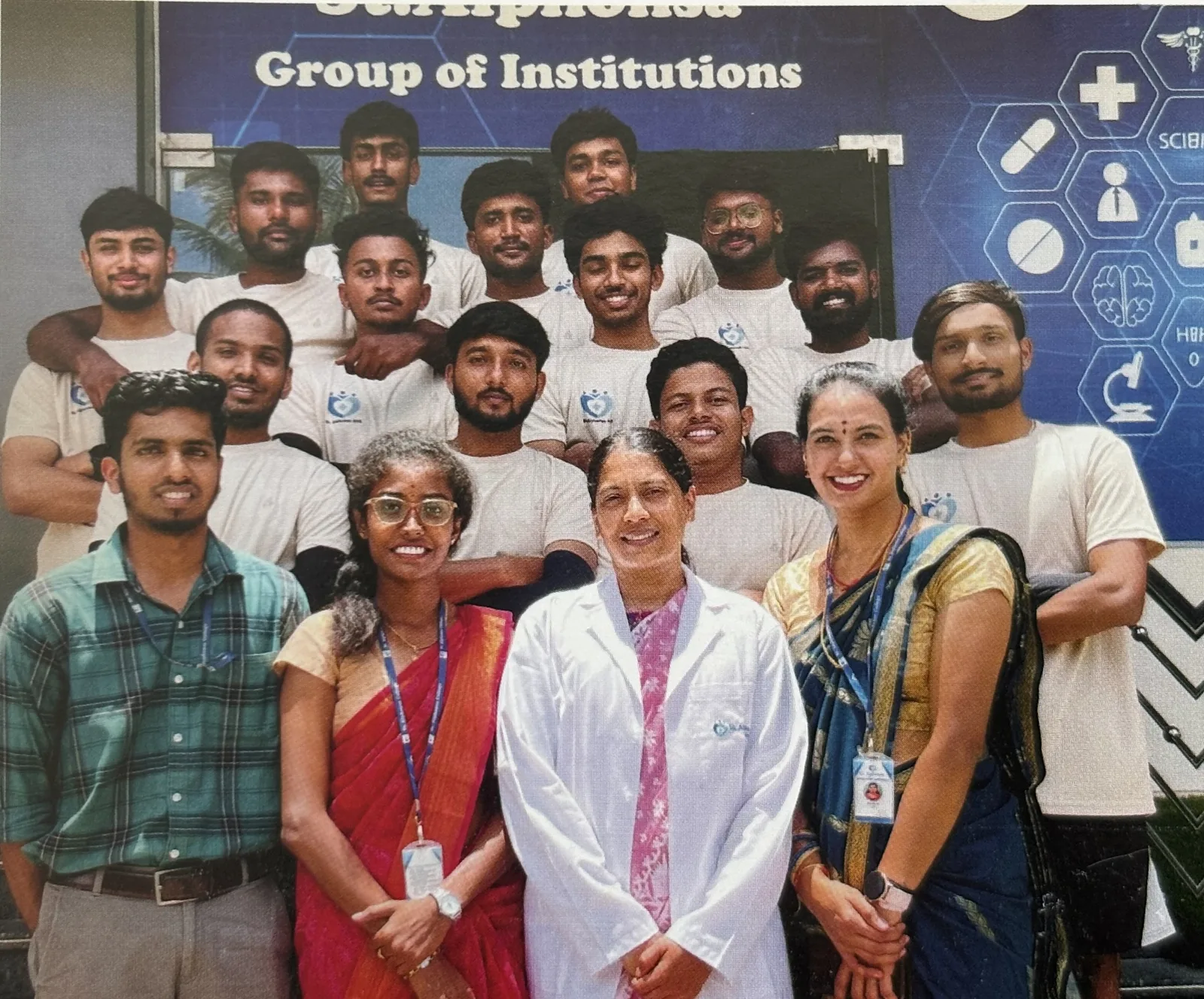 St Alphonsa allied health students with faculty in front of the institute